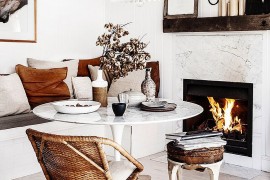 Marble fireplace and Saarinen Tulip Table bring timeless elegance to the dining space