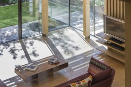 Modern cubic addition to Georgian London home connected with the rear garden