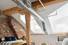 Modern industrial bedroom of penthouse loft in Toronto [Design: Rad Design Inc]