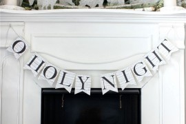 O Holy Night banner over fireplace