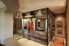 Reclaimed timber walls create a fabulous modern-rustic bathroom