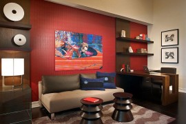 Red accent wall in the contemporary home office