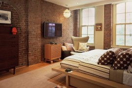 Red brick wall in the modern bedroom seems perfectly at home [Design: BarlisWedlick Architects, Tribeca Studio]