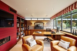 Red wall brings color and texture to the home office