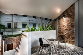 Sitting area of the suite with a view of the lush private garden