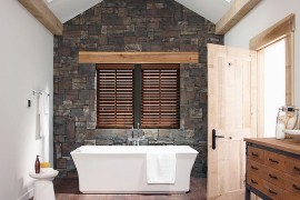 Skylights give the bathroom dramatic visual appeal