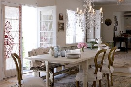Sparkling chandelier becomes the focal point in this dining room [From: Chandi Lighting]