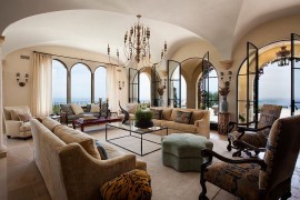 Steel door windows open up to bring the fresh sea breeze indoors