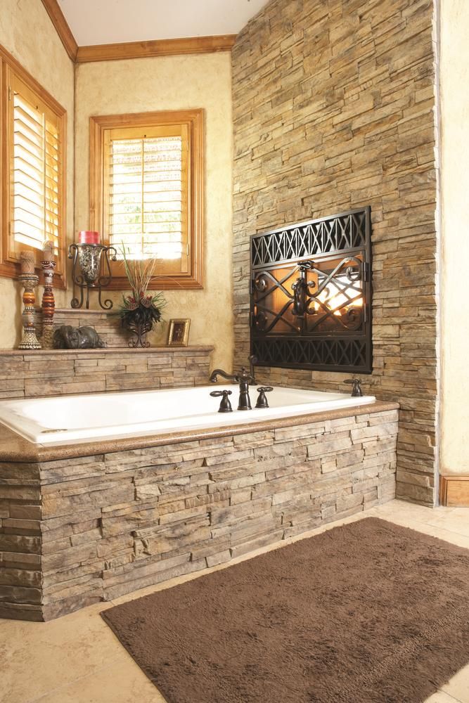 Stone fireplace and tub