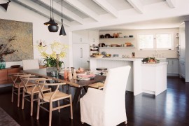 Tom Dixon lighting over a dining room table