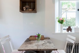 Upcycled and recycled finds create a small dining room [Photography: Chris Snook]