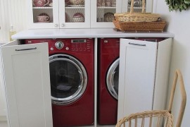 Washer and dryer hidden in a kitchen hutch
