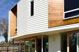 Wavey form of the upper level gives the home a playful, modern vibe