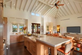 White ceiling spotlights in a kitchen with tropical accents