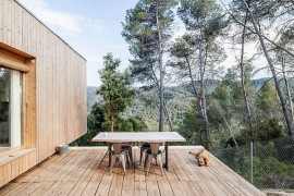 Outdoor deck space seems like a natural extension of the wooden structure