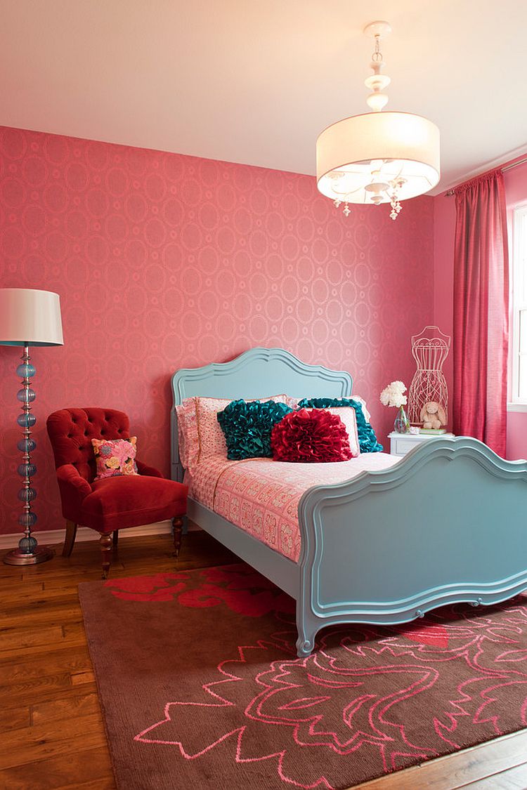 A dash of red in girls bedroom draped in pink