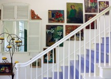 Wall art adds to the shabby chic style of the staircase in white 217x155 11 Fabulous Staircases That Exude Shabby Chic Panache