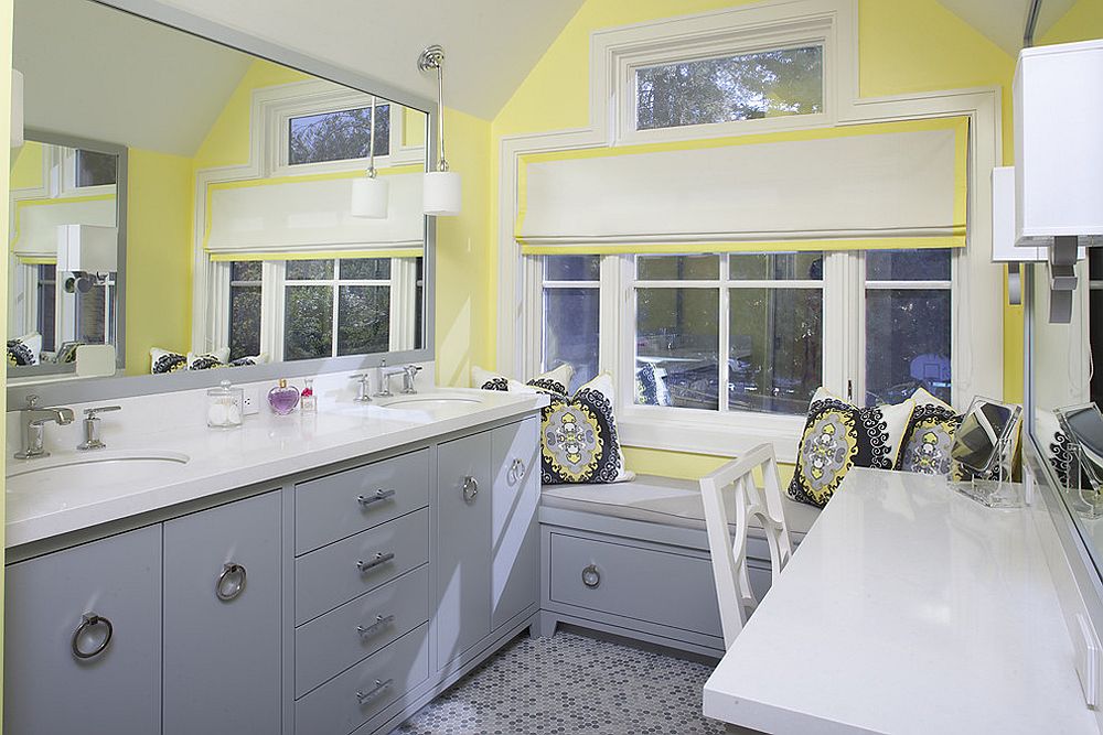 gray sink and yellow walls bathroom