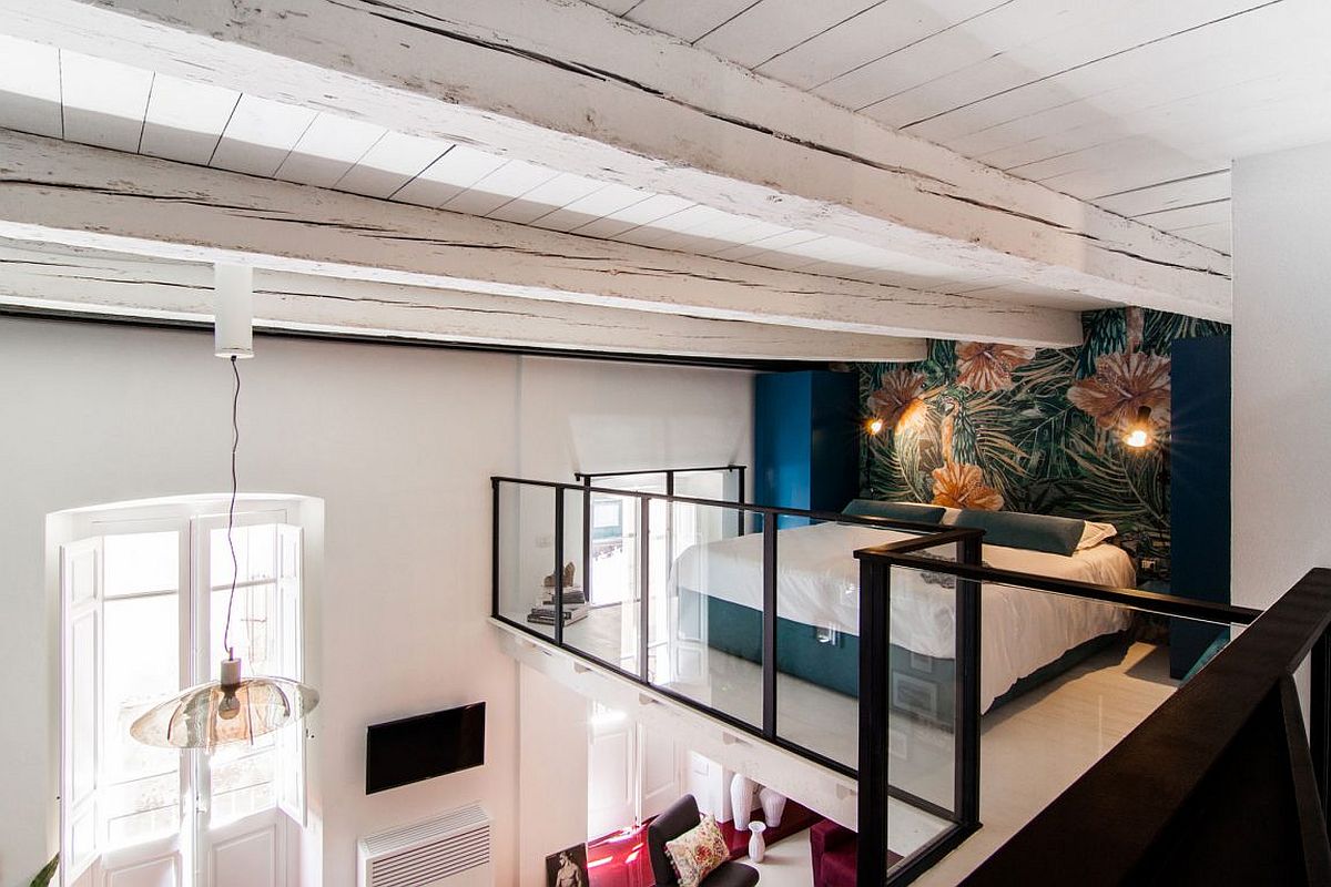 Space savvy italian home delights with a nifty mezzanine level bedroom