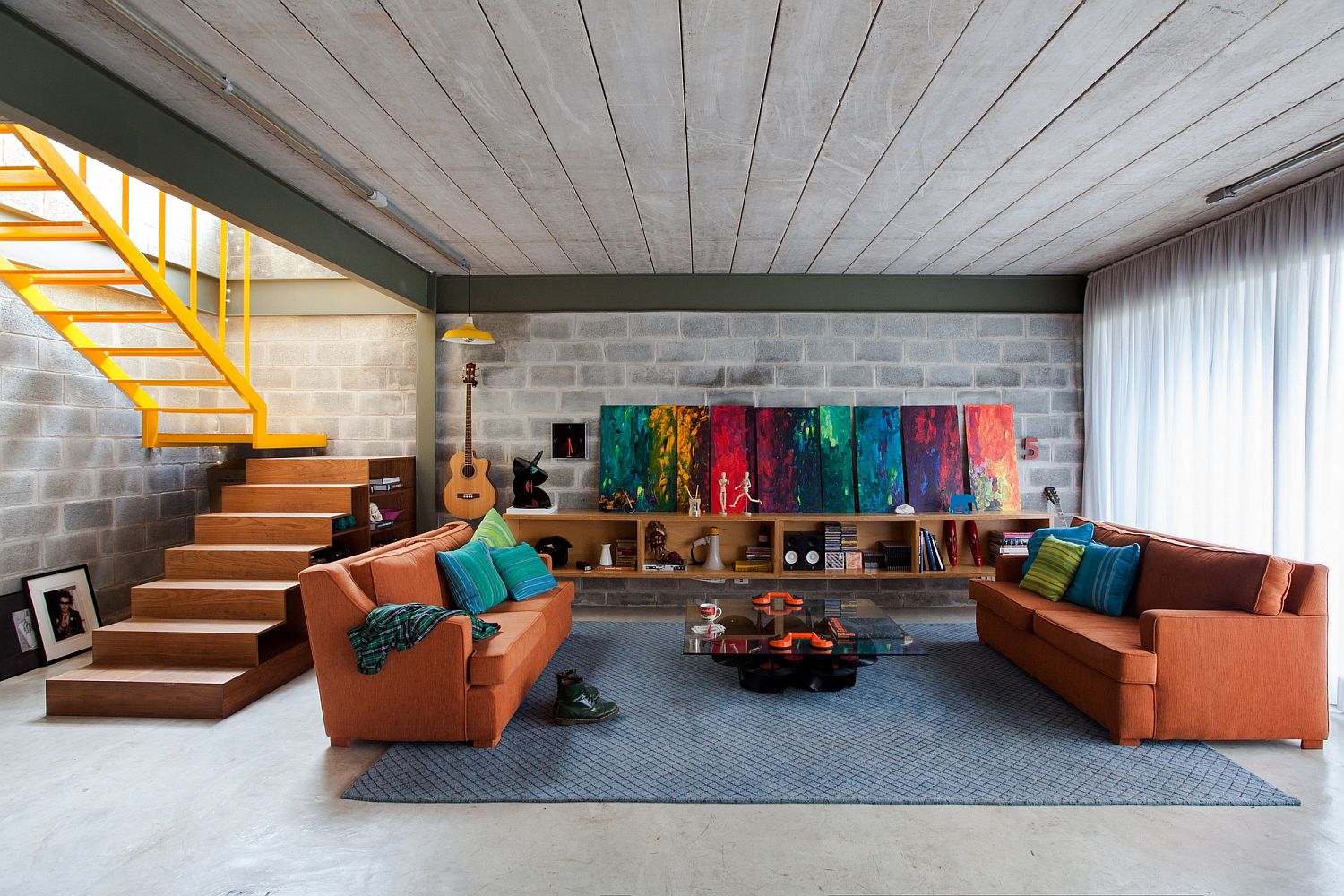 Cement and Concrete Brazilian Home is Energized with Bright Color