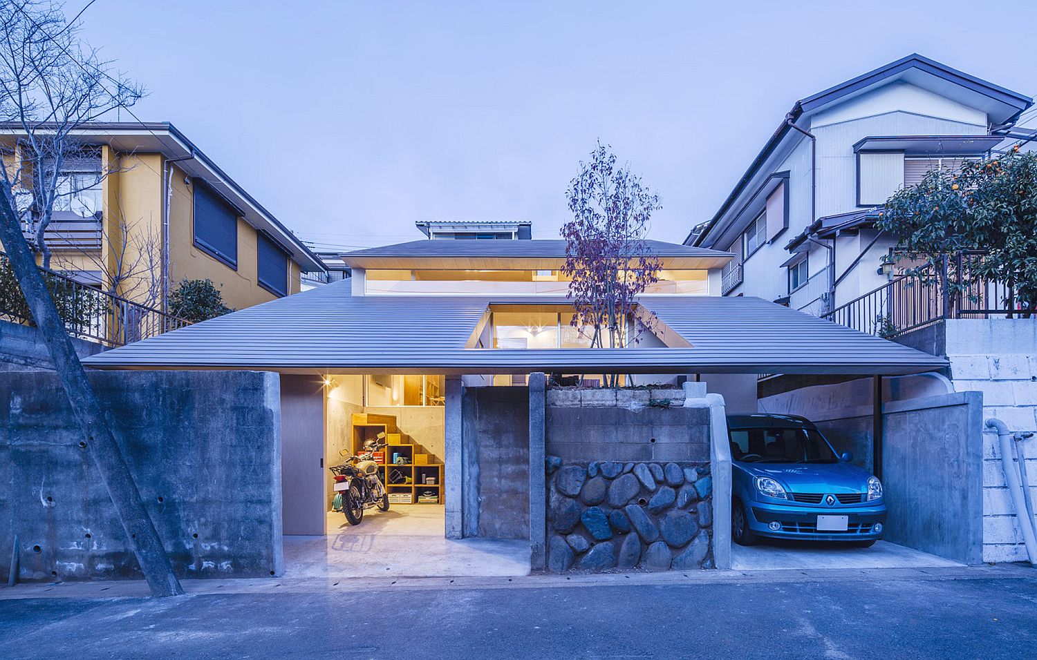 Chic Japanese House Integrates Old Retaining Wall With Woodsy Slanted Roof
