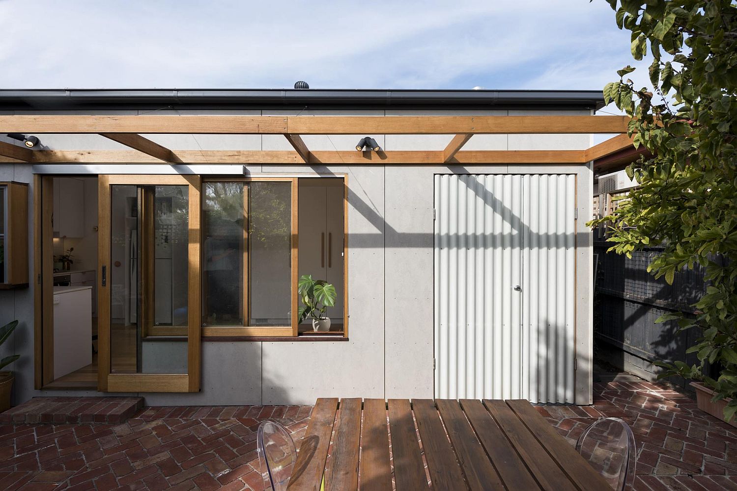 Cheerful Rear Addition to Melbourne Home in White, Timber and Copper