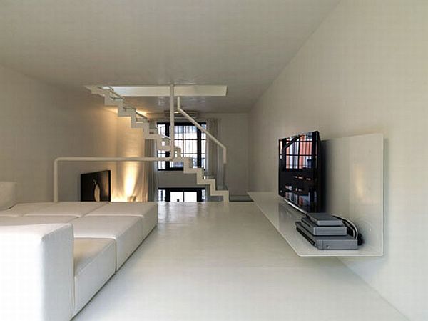 Minimalist loft with a strong contrast of dark and white 