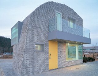 Day-care during daytime, residence at night: Pixel House