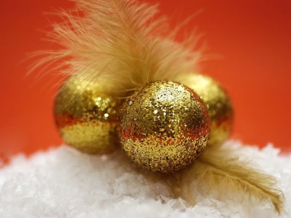 Christmas baubles in golden yellow