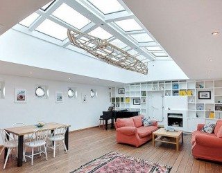 Barge Converted to a Floating House in Stockholm