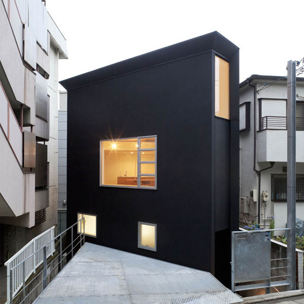 Narrow Japanese home with voluminous interiors 1