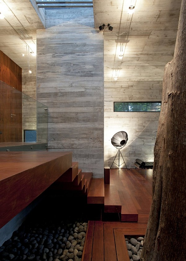 Corallo House by Paz Arquitectura - concrete wall furnishings