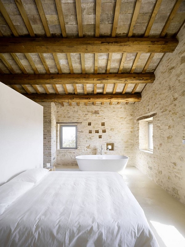 Italian House Renovation concrete stone bedroom with bathtub