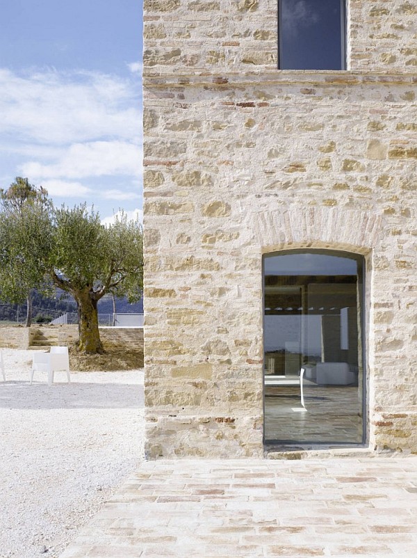 Italian House Renovation stone concrete and glass entrance