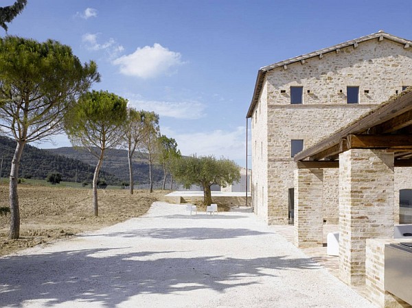 Italian House Renovation wood concrete stone exterior