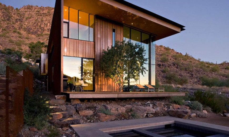 Jarson Residence Dressed in a Weathered Steel and Cooper Skin