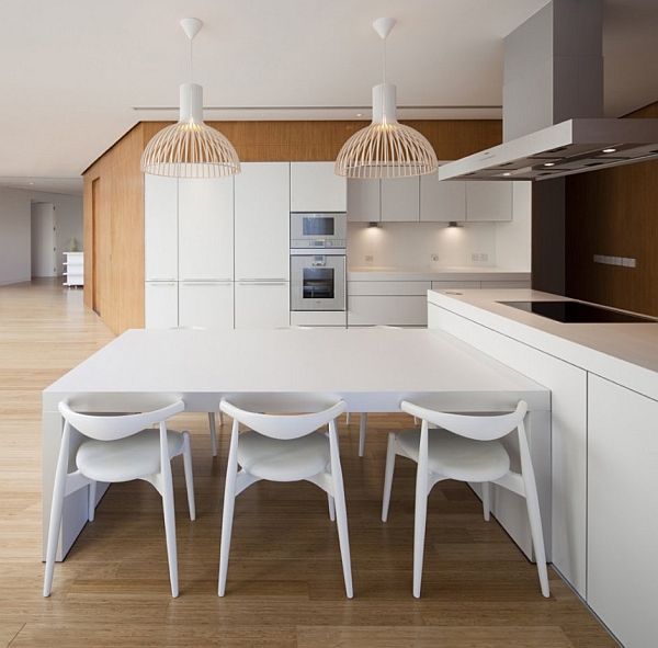 Mop House - minimalist kitchen with white furniture and island