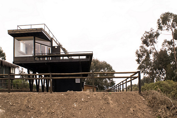 Tacna Hill Beach House black wooden house