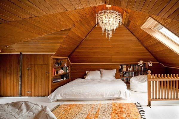 attic-bedroom-interior-with-wooden-accents