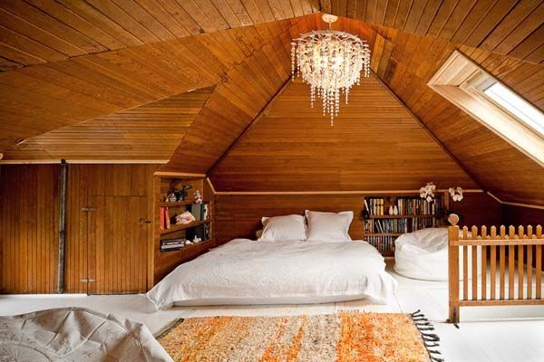 attic bedroom interior with wooden accents