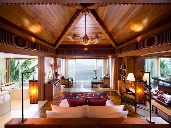 bedroom in resort villa with ocean & mountain views