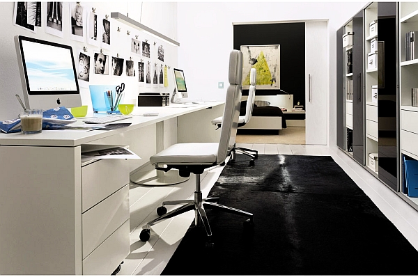 ultra modern white home office with Apple products