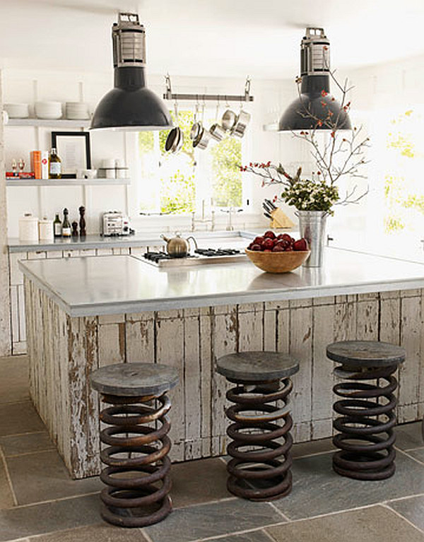 Airy KItchen with repurposed wood island and coil springs chairs