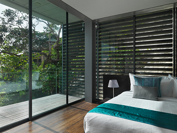 Villa-Amanzi-luxury-bedroom-with-contemporary-design-and-glass-wall