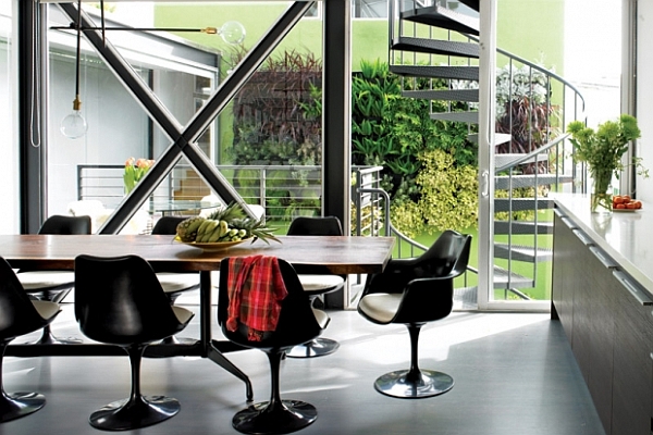 contemporary dining room with black chairs