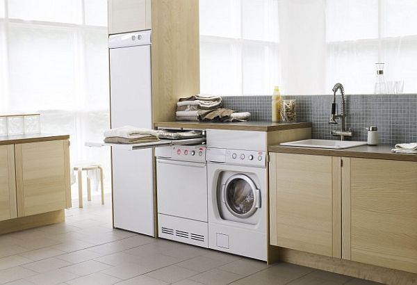 laundry-room-with-folding-table-white-and-cream-furniture