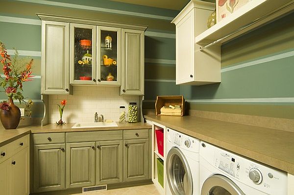 Green-laundry-room-with-traditional-cabinets