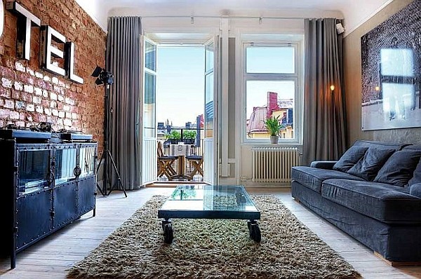 One Bedroom Apartment Stockholm 1 - living room with brick walls