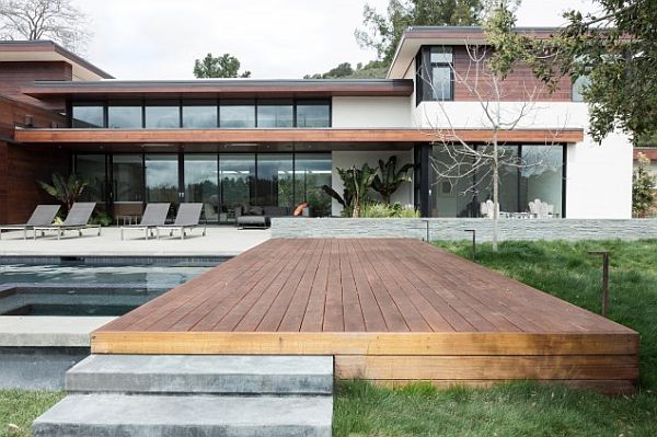 backyard pool with wooden deck