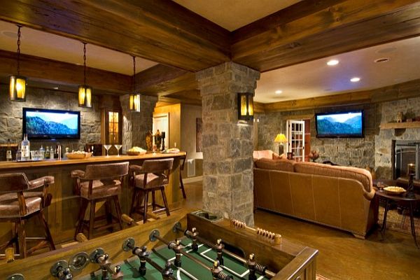 basement gaming center with bar and bar stools